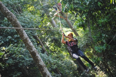Taylor on a zip line adventure.